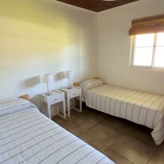 Segundo dormitorio con dos camas